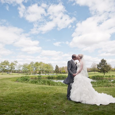 Couple kissing by the lake