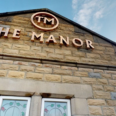 Main entrance with sign
